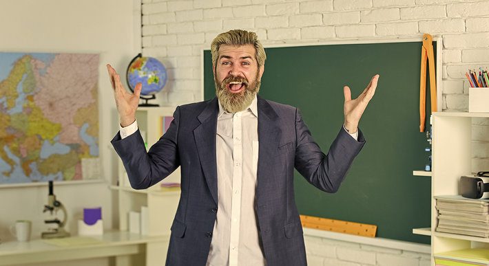 Teacher at Chalkboard