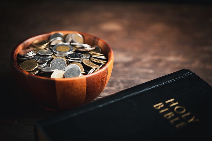 Bible with coins