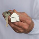 Man holding new house keys