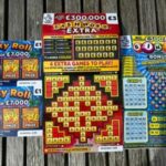 Set of three lottery scratch cards