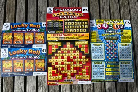 Set of three lottery scratch cards