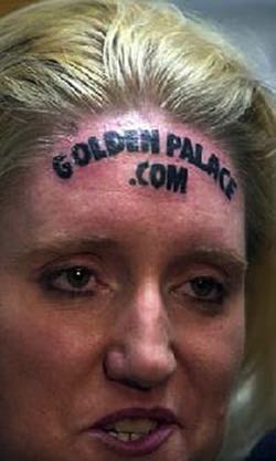 Golden Palace forehead tattoo