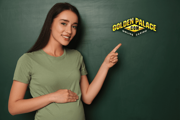 Pregnant woman pointing to Golden Palace Casino logo